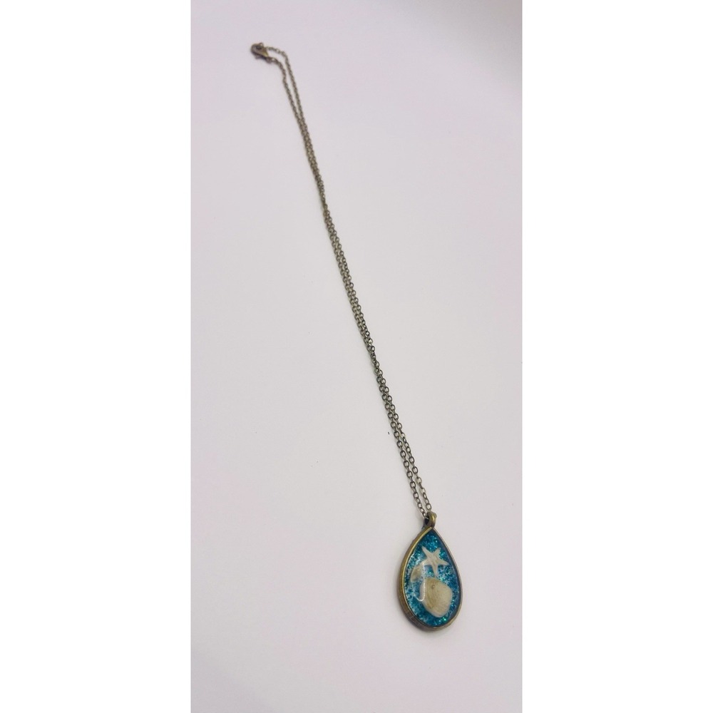 Resin gold Plated necklace with natural seashells. 18 Inch